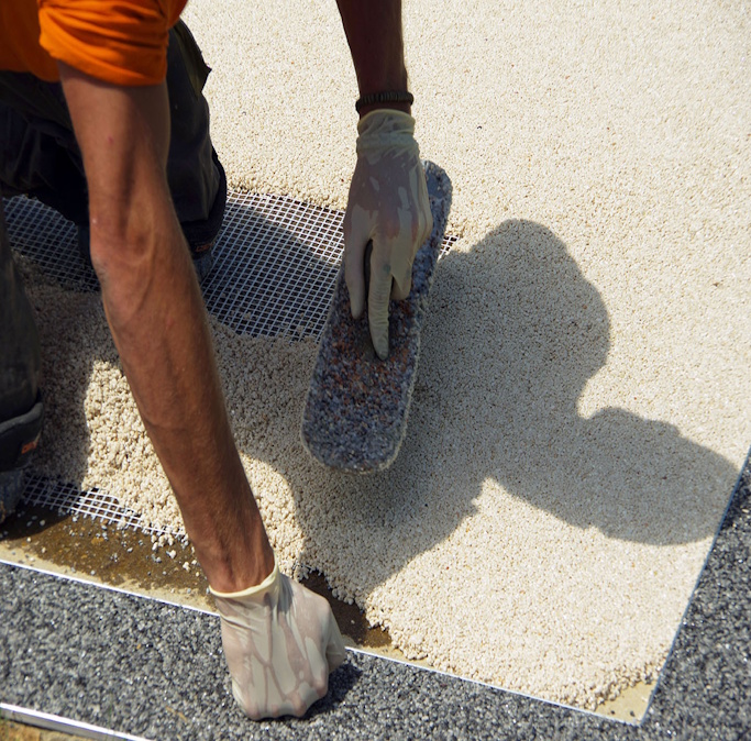Specialist applicator hand-finishing marble and resin stone carpet